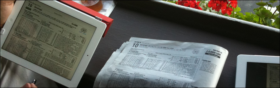 An iPad and paper version of a racing form