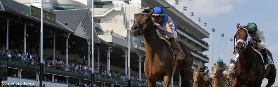 Horses in front of the grandstand at Churchill Downs